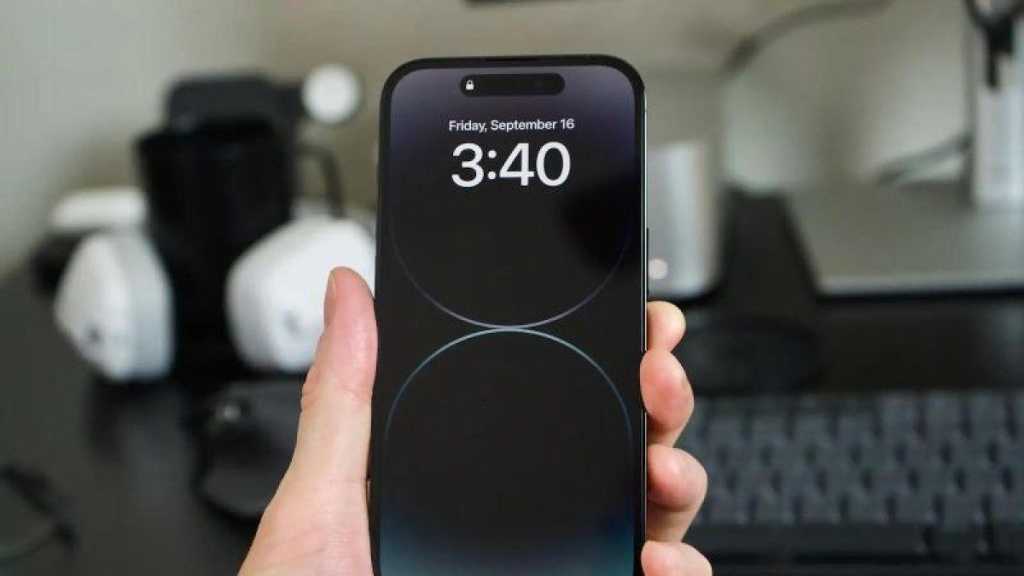 iPhone 14 Pro holding in hand