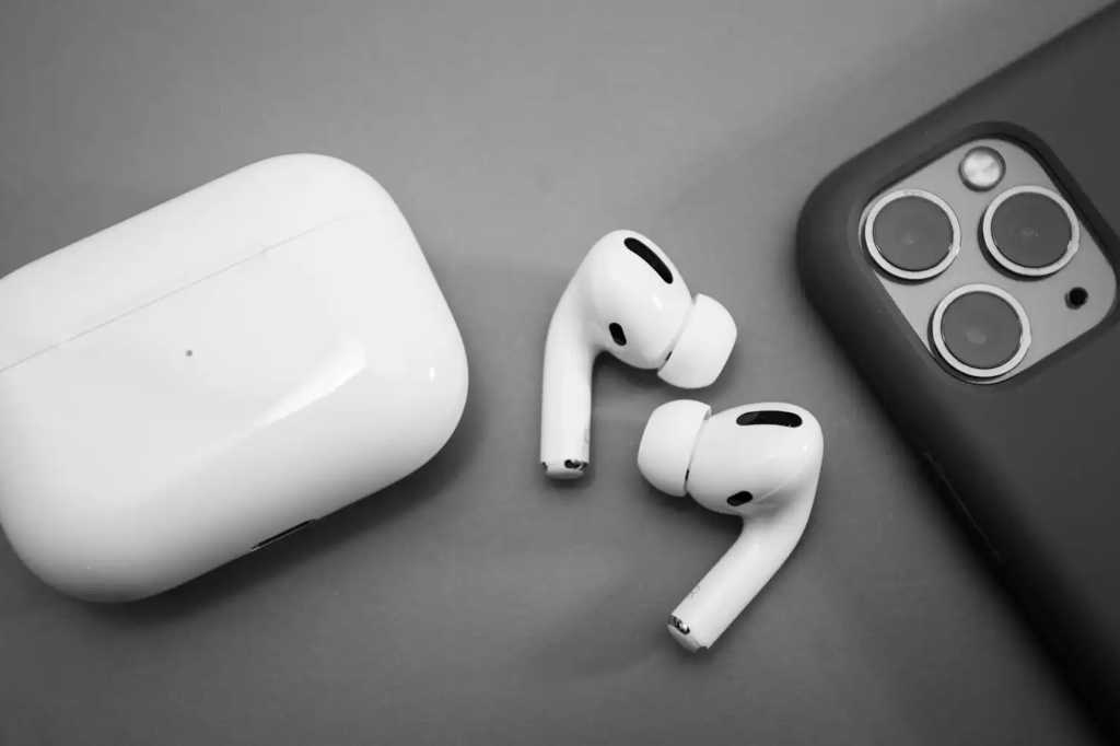 AirPods Pro with case and iPhone 14 Pro
